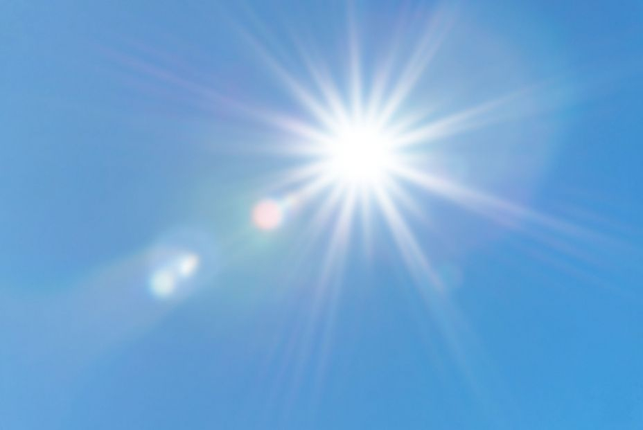 bigstock Blue Sky And Sun Reflection S 450102825