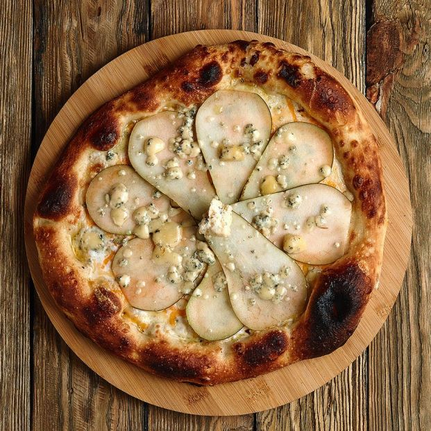 Receta de pizza de pera de Jumilla y queso azul. Foto: Bigstock Receta de pizza de pera de Jumilla y queso azul. Foto: Bigstock