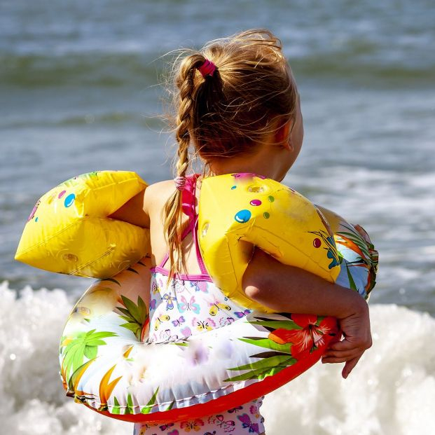 bigstock Happy Little Girl With Floatie 256712545 bigstock Happy Little Girl With Floatie 256712545