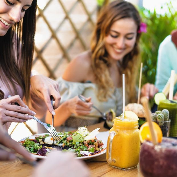 bigstock Happy Friends Lunching With He 418996603