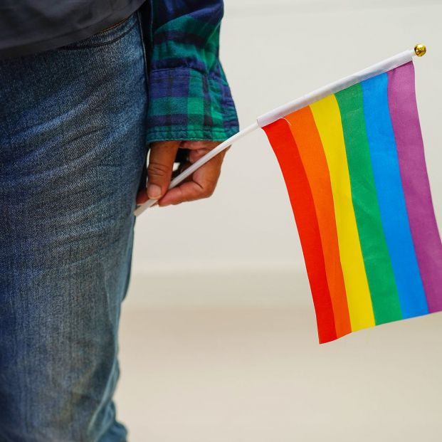 bigstock Asian Woman With Rainbow Flag454399473