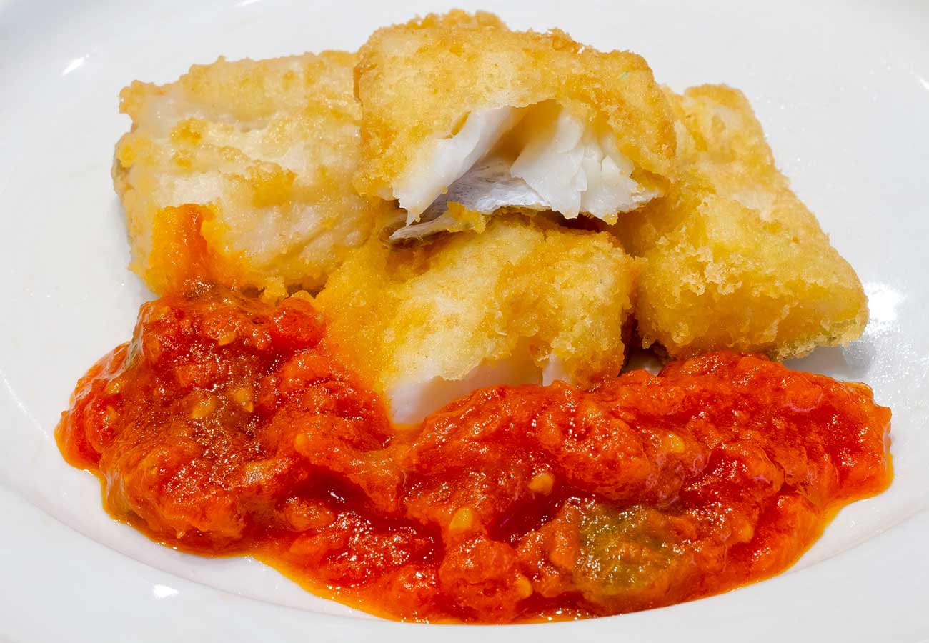Receta de bacalao fresco rebozado con tomate