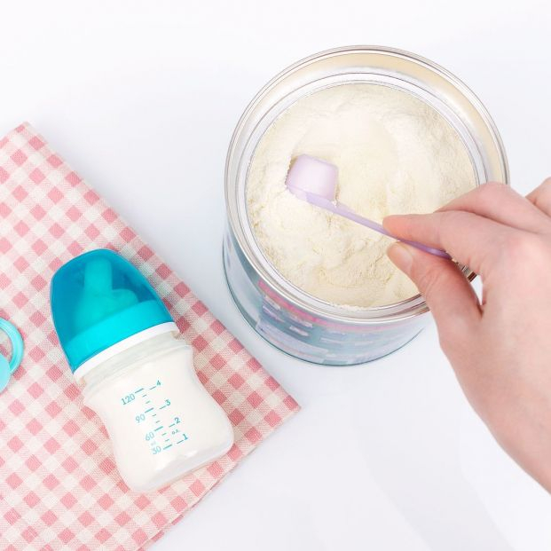 bigstock Woman s Hand Grabbing A Scoop405947555