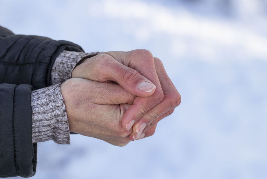 bigstock Women s Frozen Hands In The Co 467958817