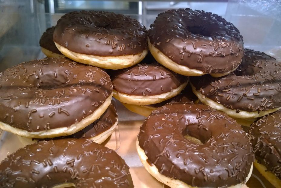 bigstock Donuts With Black Chocolate Gl 443506943 bigstock Donuts With Black Chocolate Gl 443506943