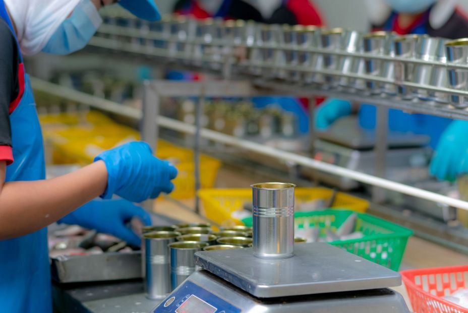 bigstock Worker Working In Canned Food466251633