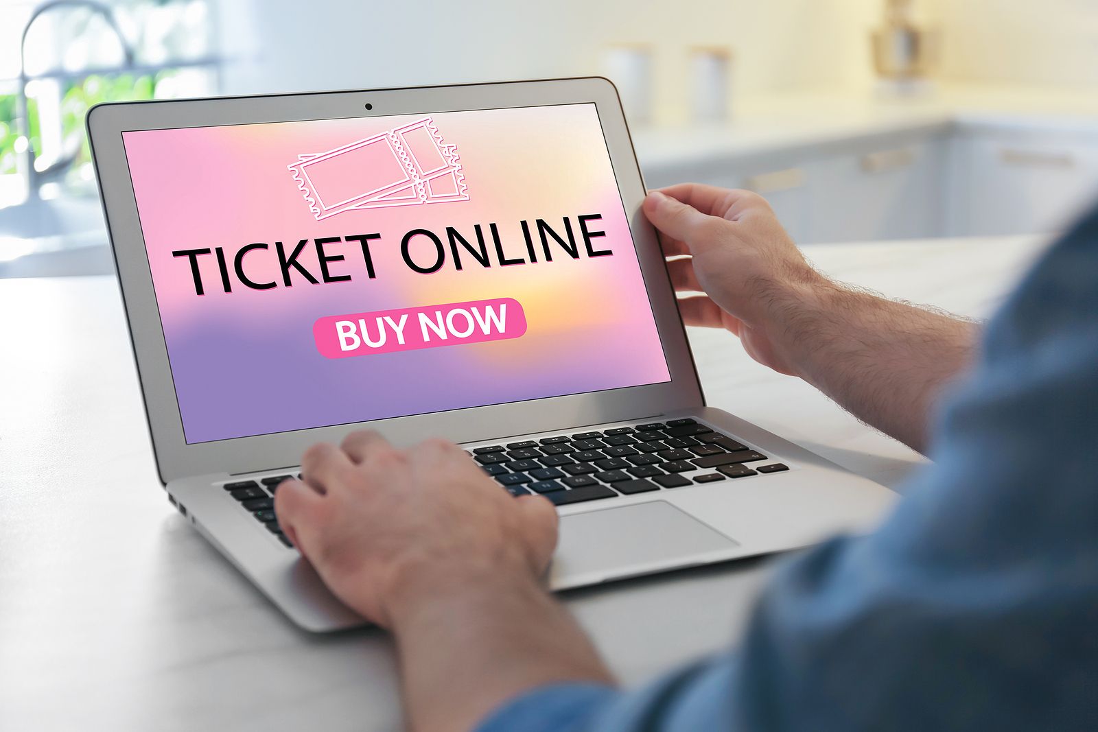 bigstock Man Buying Tickets Online Via476831353