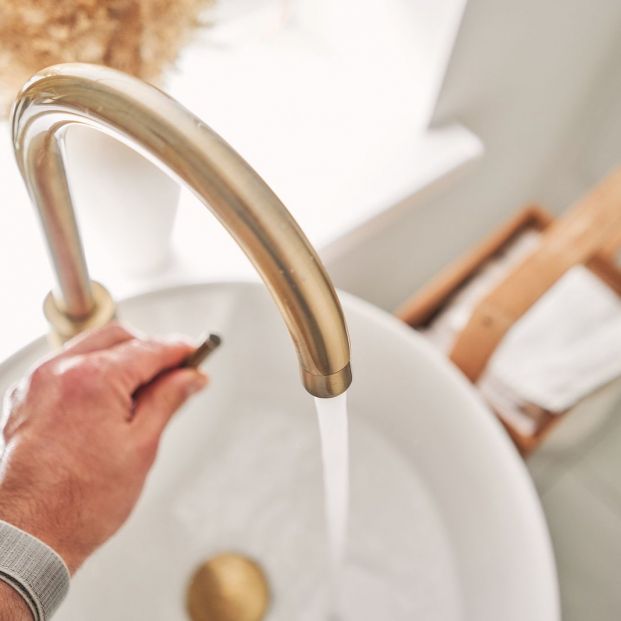 bigstock A Mans Hand Touches The Water477597011