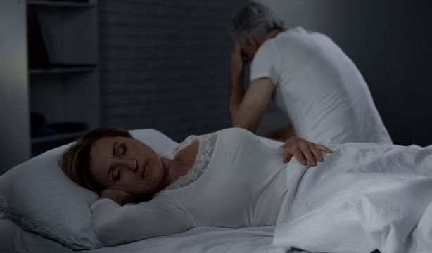 bigstock Elderly Lady Sleeping Husband 358902760