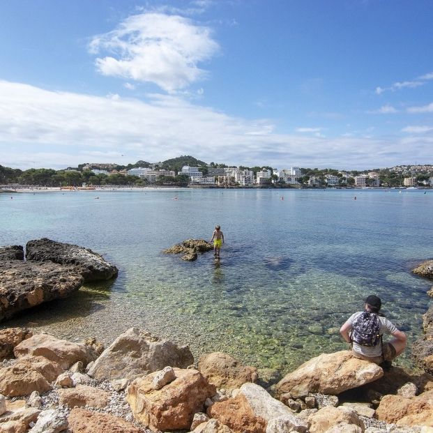 bigstock Bathers Shallow Water Rocky Co 304114501 bigstock Bathers Shallow Water Rocky Co 304114501