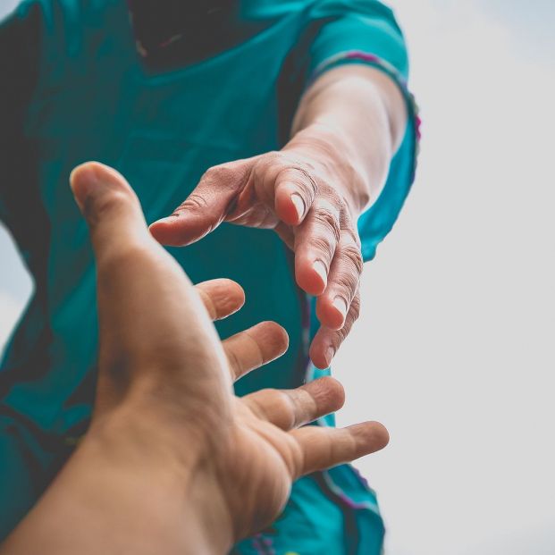 bigstock Help Concept Hands Reaching Ou 360332656