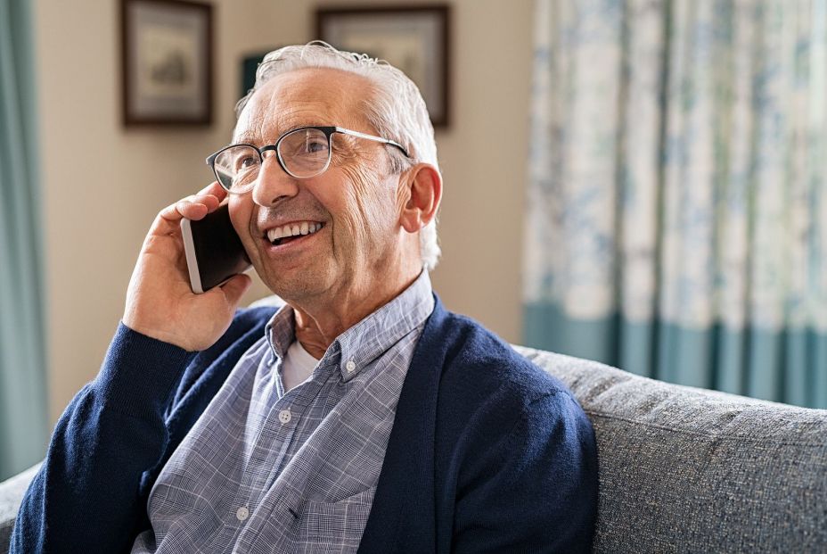 bigstock Smiling old man talking over s 421235966 bigstock Smiling old man talking over s 421235966