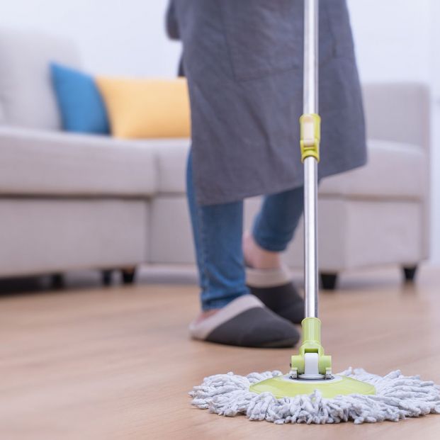 bigstock Mop Floors Young Woman Washin 360508429