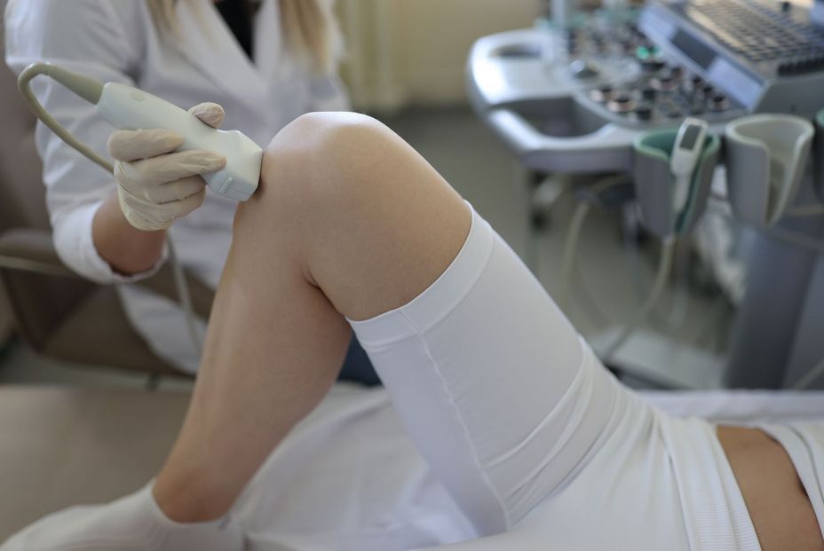 bigstock Doctor Doing Ultrasound Examin 420086854