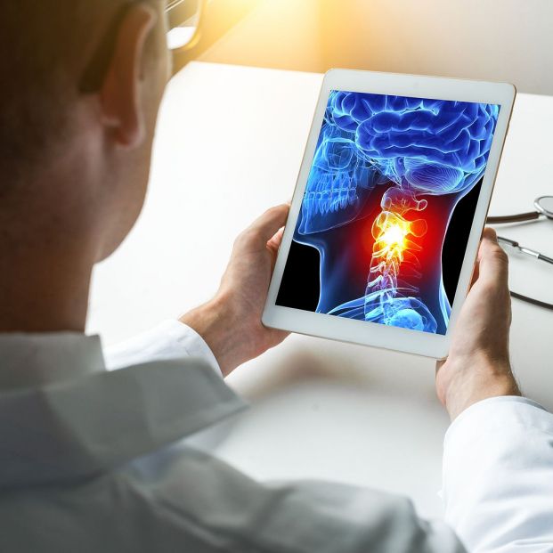 bigstock Doctor Holding a Digital Table 303750721