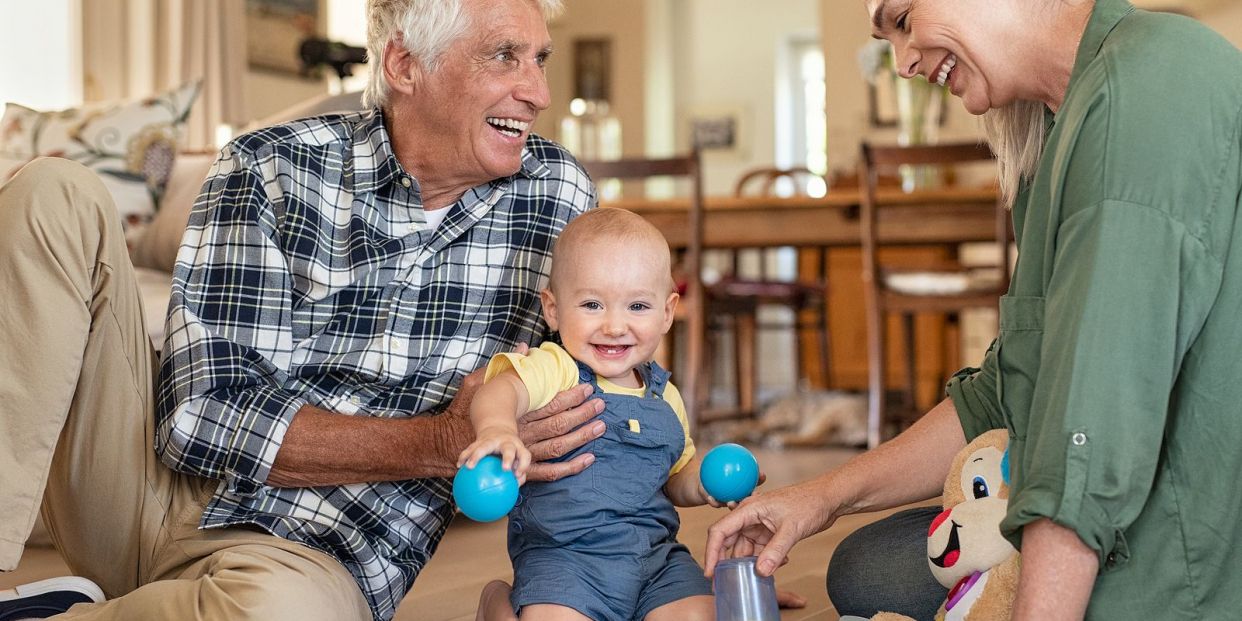 bigstock Smiling grandchild with grandp 308083174