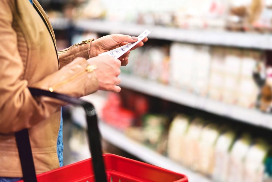 bigstock Woman In Supermarket Aisle Wit 244377046