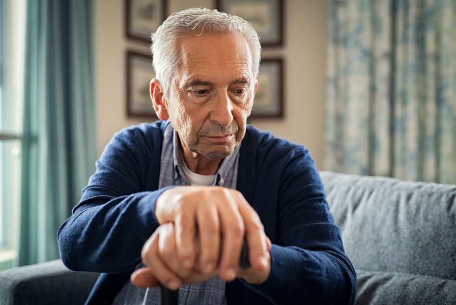 bigstock Depressed old man sitting at h 421752167 (1)