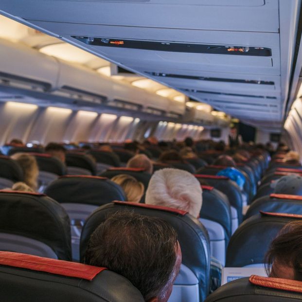 En el avión overbooking En el avión overbooking