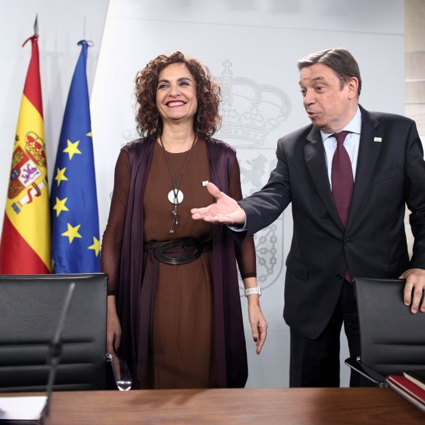 La portavoz del Gobierno, María Jesús Montero, y el ministro de Agricultura, Luis Planas, en la rueda de prensa tras el Consejo de Ministros La portavoz del Gobierno, María Jesús Montero, y el ministro de Agricultura, Luis Planas, en la rueda de prensa tras el Consejo de Ministros