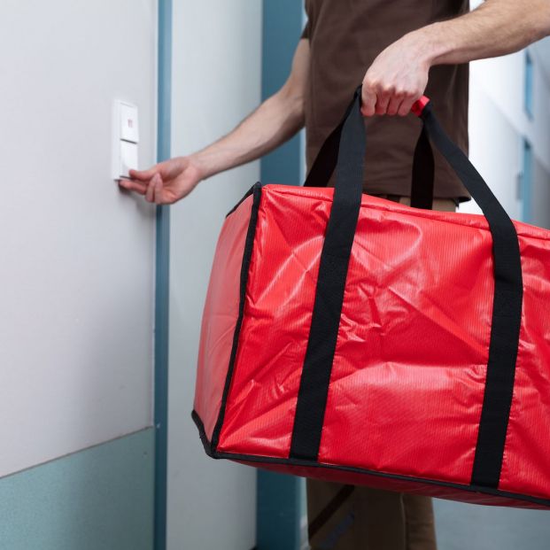 bigstock Pizza Delivery Man Ringing The 296343793 bigstock Pizza Delivery Man Ringing The 296343793