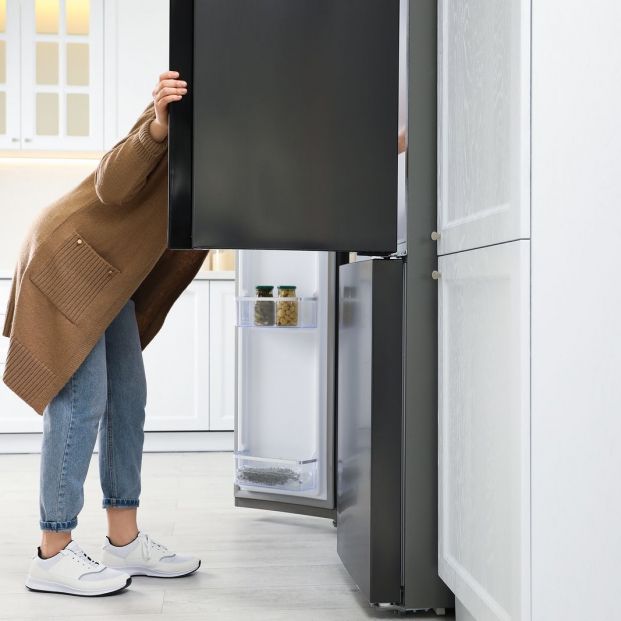 bigstock Young Woman Looking Into Refri 355038995 bigstock Young Woman Looking Into Refri 355038995