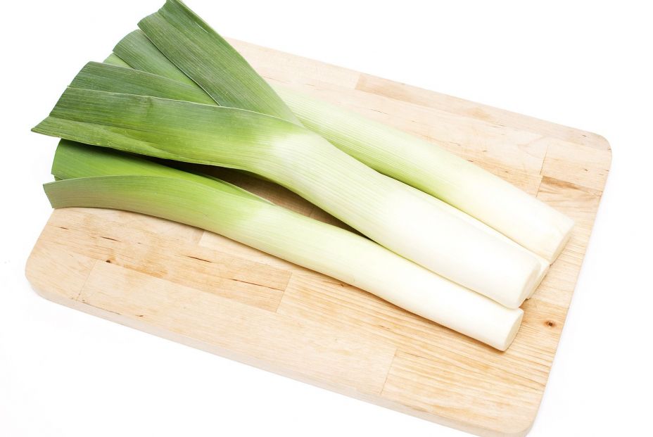 bigstock fresh leek lying on wooden boa 14974436 bigstock fresh leek lying on wooden boa 14974436
