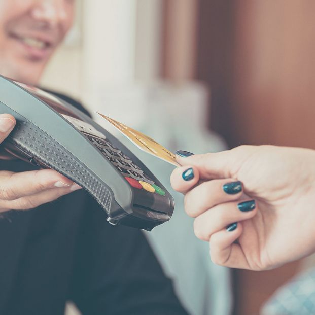 bigstock Customer Paying Money With Con 351199928 bigstock Customer Paying Money With Con 351199928