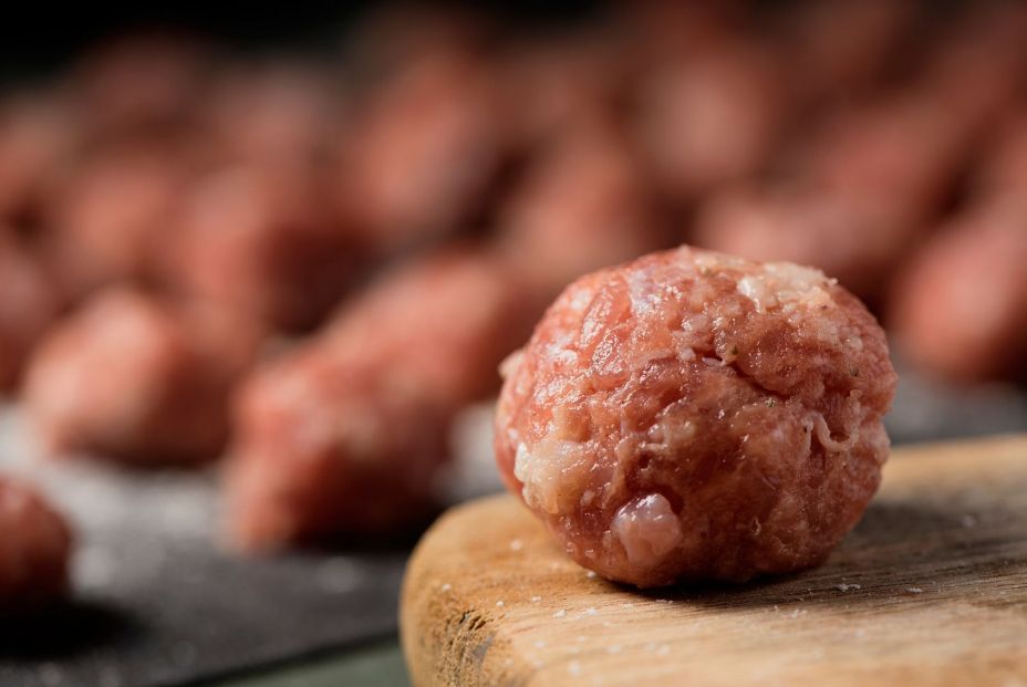 bigstock closeup of a raw meatball on a 311926510 bigstock closeup of a raw meatball on a 311926510