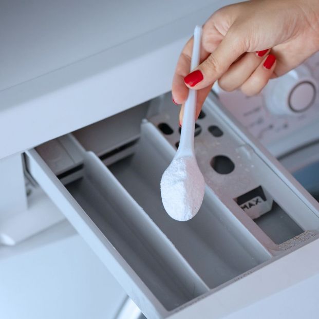 bigstock Girl Loads Detergent Into The367829077 bigstock Girl Loads Detergent Into The367829077