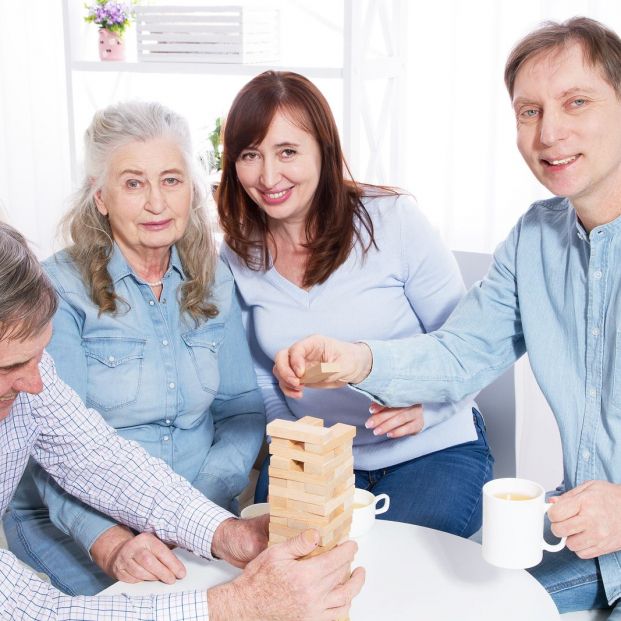 bigstock Elderly Couple With Family Clo 368662846