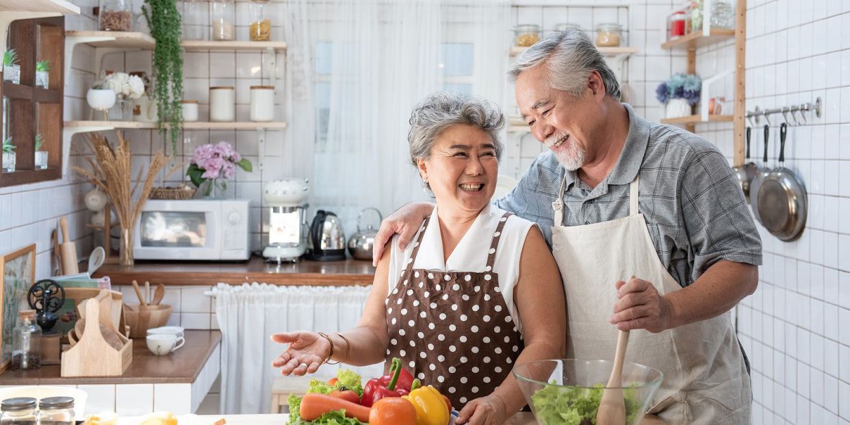 bigstock Senior Couple Having Fun In Ki 347571301