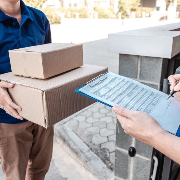 bigstock Young Delivery Man Deliver Box 345968419 bigstock Young Delivery Man Deliver Box 345968419