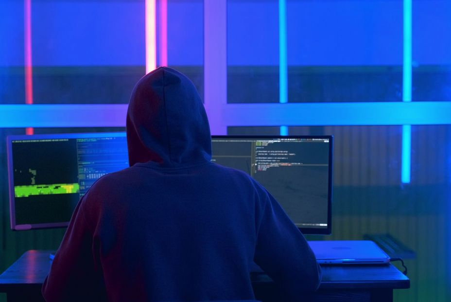 bigstock Back View Of Hacker In A Black 347466946 bigstock Back View Of Hacker In A Black 347466946