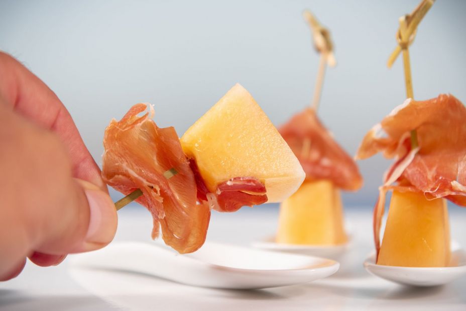 bigstock A Male Hand Holding A Skewer M 375504505 bigstock A Male Hand Holding A Skewer M 375504505