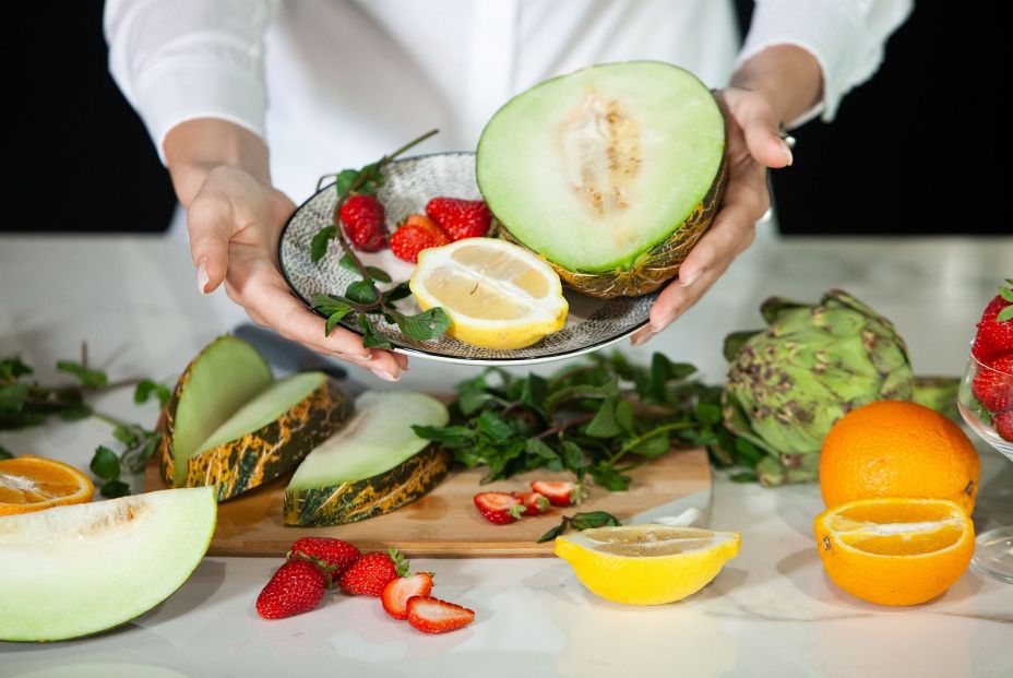 bigstock Closeup On Woman Making Fruits 369108520
