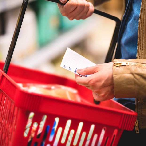 bigstock Hand Holding Shopping List And 244377079 bigstock Hand Holding Shopping List And 244377079