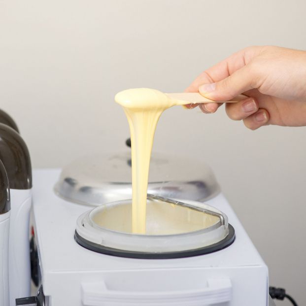 bigstock Woman Preparing The Wax For Th 301425721 bigstock Woman Preparing The Wax For Th 301425721