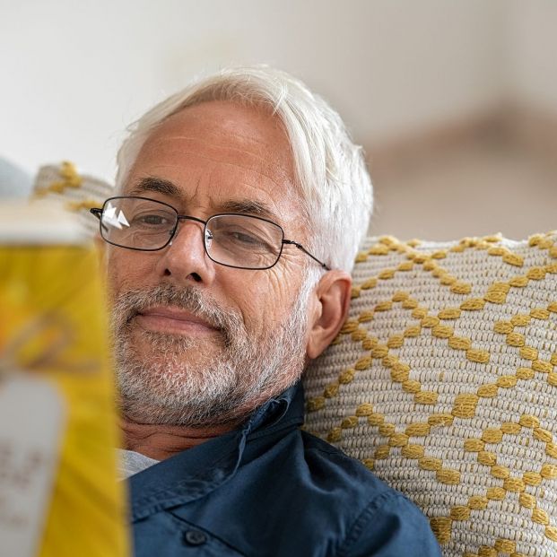 bigstock Happy mature man reading a boo 363994552 bigstock Happy mature man reading a boo 363994552