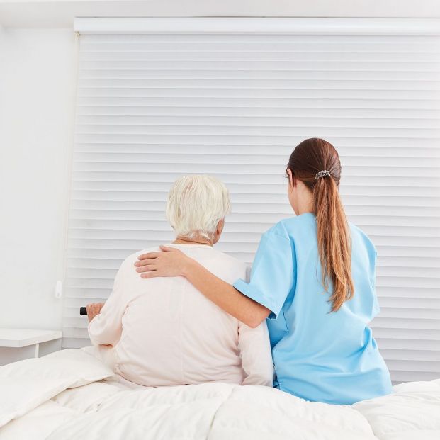 bigstock Young caregiver helps elderly360384280