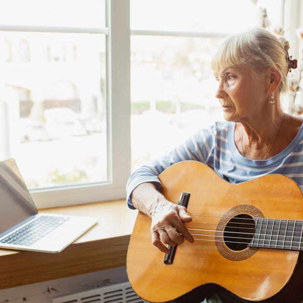 bigstock Learning To Play Guitar Online 383715464 bigstock Learning To Play Guitar Online 383715464