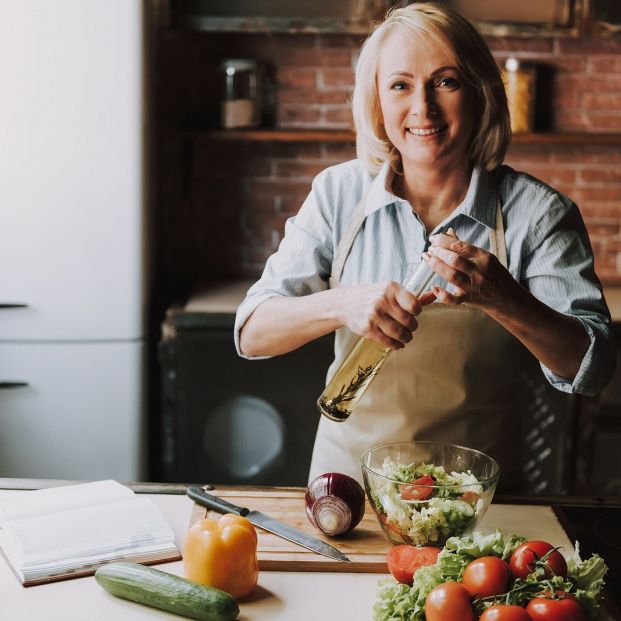 bigstock Senior Woman Cooking Salad In256985776 bigstock Senior Woman Cooking Salad In256985776