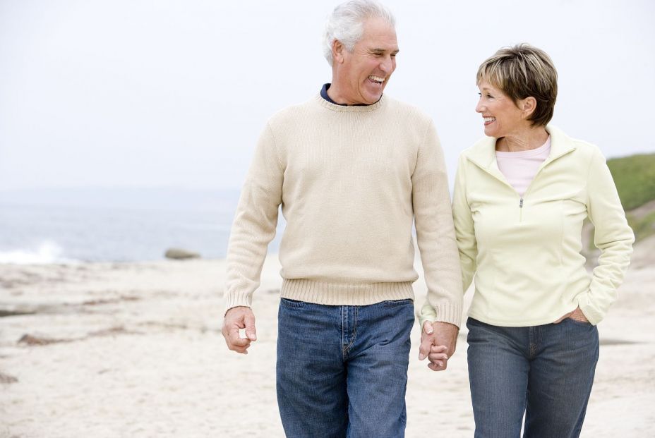 bigstock Couples At The Beach Holding H 4134045