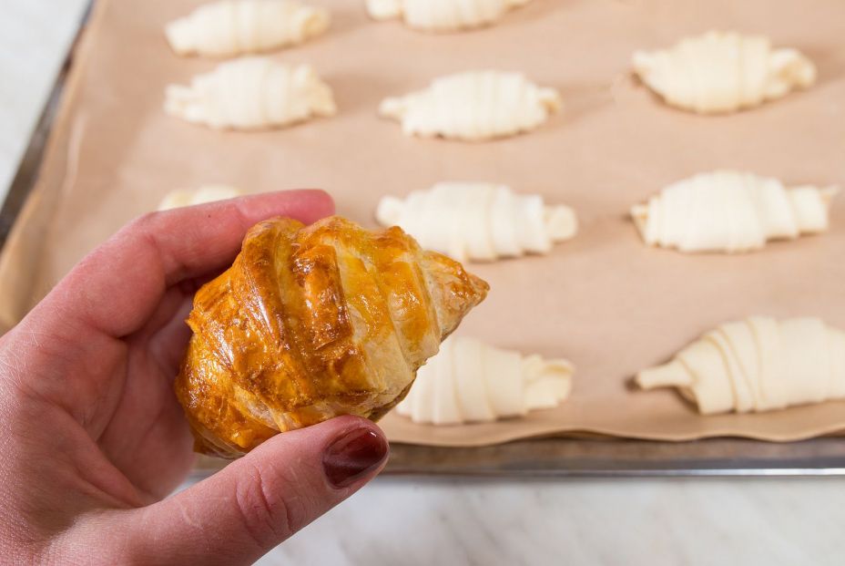 bigstock Little Baked Croissant In Hand 407852723 bigstock Little Baked Croissant In Hand 407852723