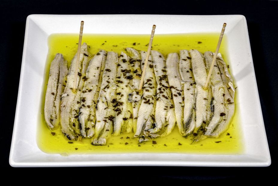 bigstock A Pile Of Anchovies In Vinegar 248292643 bigstock A Pile Of Anchovies In Vinegar 248292643