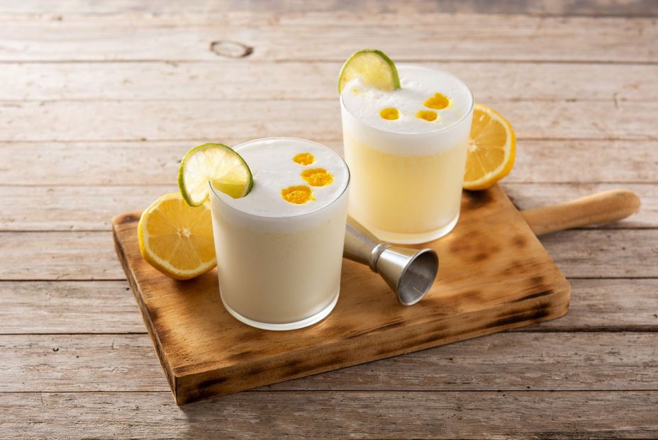 bigstock Pisco Sour Cocktail On Wooden419187127 bigstock Pisco Sour Cocktail On Wooden419187127