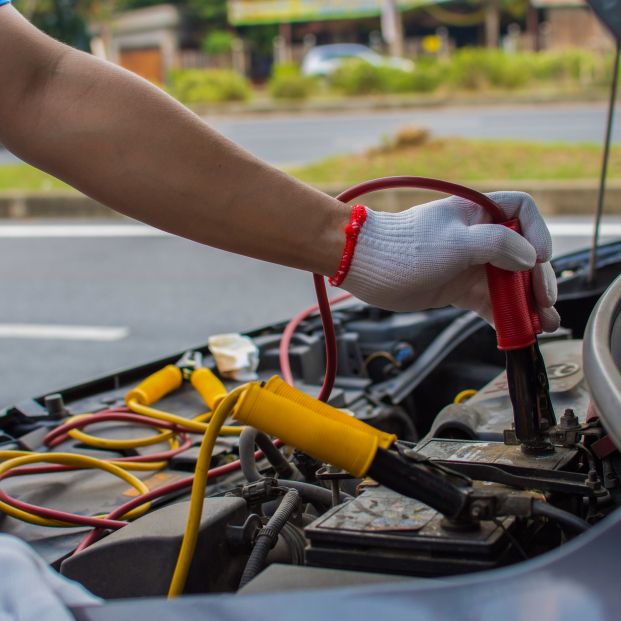 bigstock The Technician Uses A Booster384648587