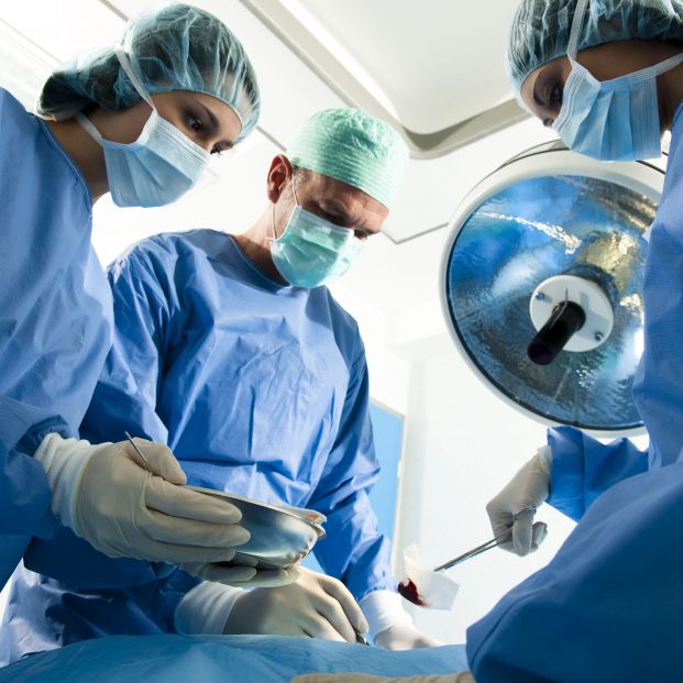 bigstock Portrait of team of surgeons a 27552770