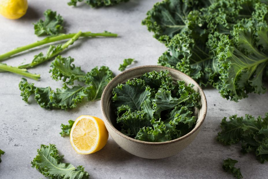 bigstock Fresh Torned Kale Leaves In A433549739