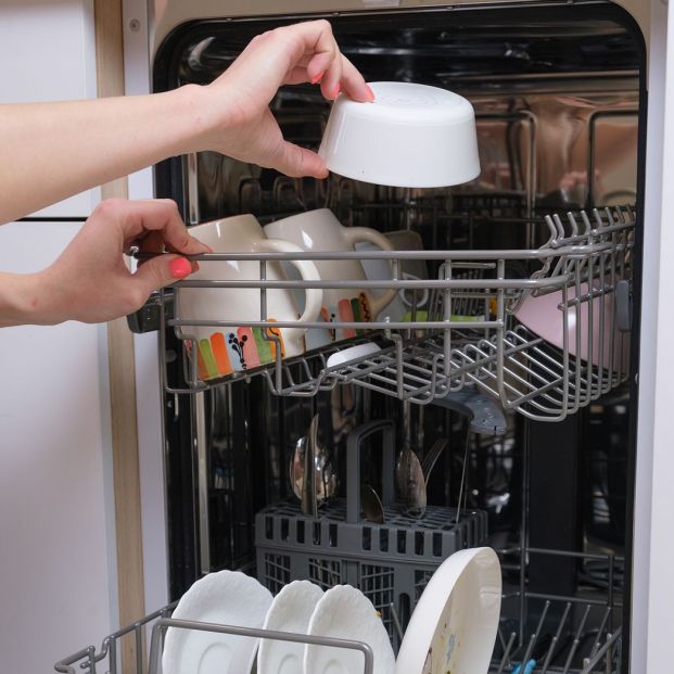 bigstock Female Hands Put Dirty Dishes441137102